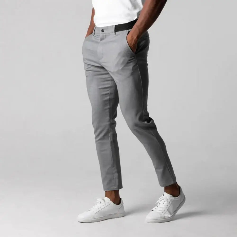 Step Up Your Style: Elegant Slim Fit Business Pants at RokstarModern. Elevate your professional attire with these sleek and sophisticated trousers, designed for the modern man who values both style and comfort. Command attention with every step